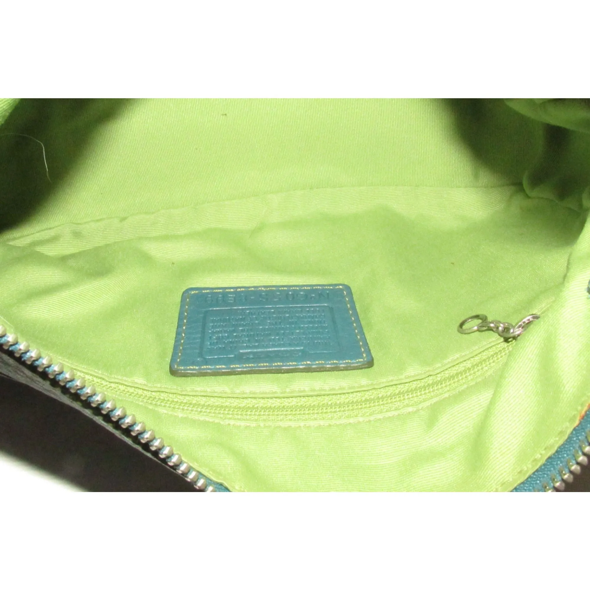 Coach, 'Chelsea' hobo, in a teal soft leather, hobo style purse with a brown, strap with unique chrome buckles