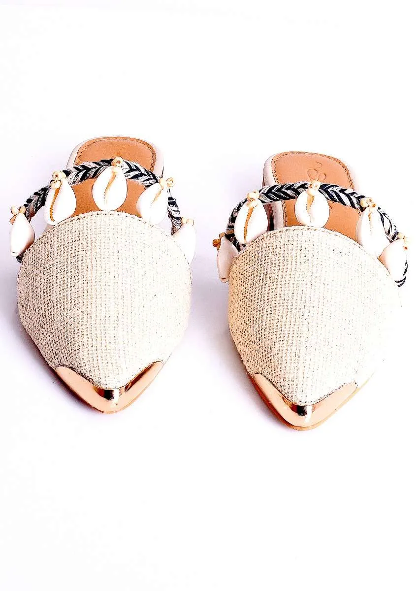 Cream Beige Mules Adorned In Wooden Beads And Conchas Along With Black Braiding By Sole House